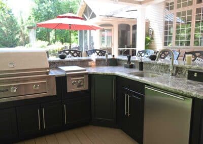 covered l shaped outdoor kitchen angled corner cabinet